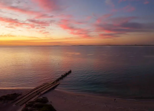 Sunset view of Rockingham jetty and coastline, Rockingham WA