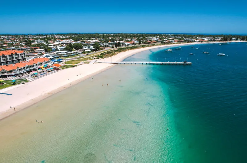 Aerial view of Rockingham Beach jetty and turquoise water, Rockingham WA